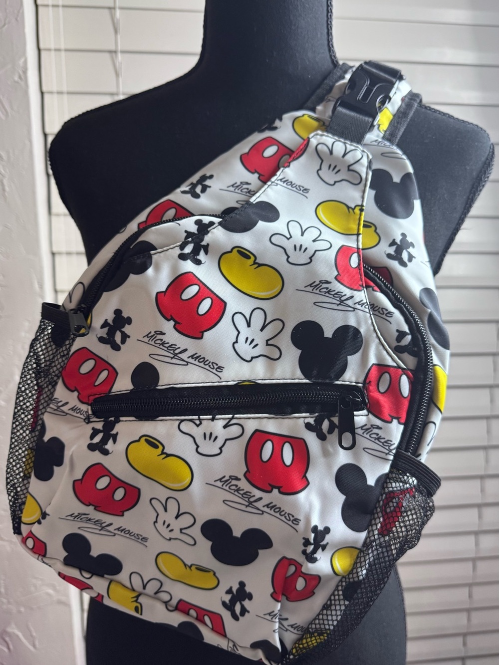 Disney White Sling Backpack with Red & Yellow Mickey Icons